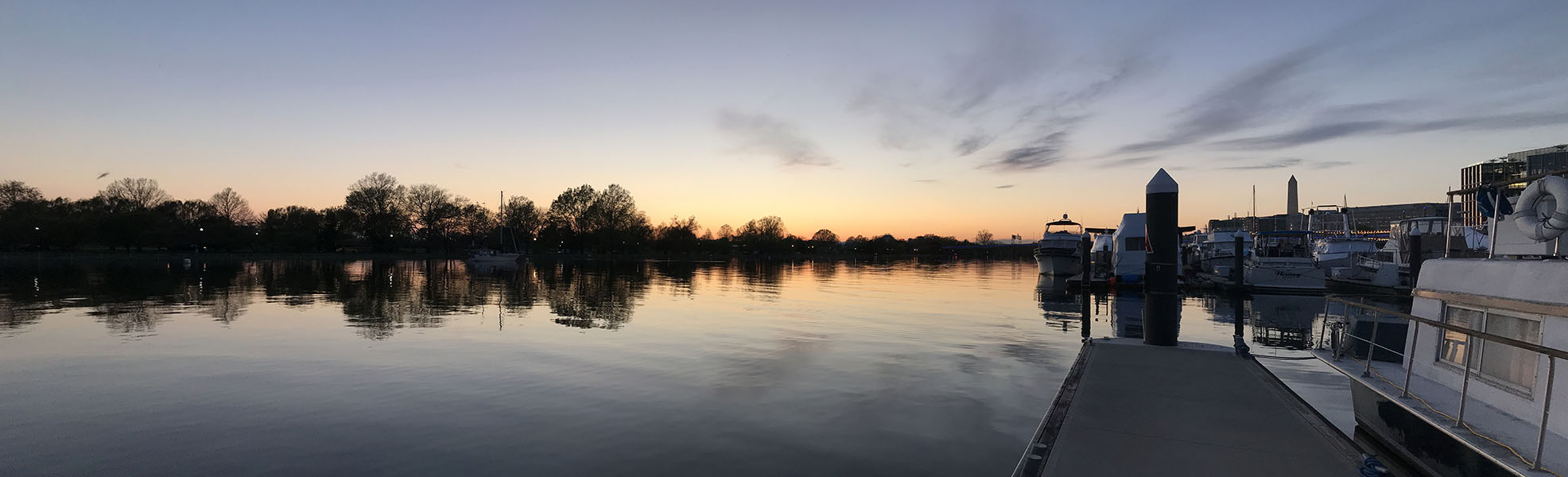 Panorama of Water, Shore, and Sunset.